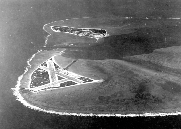 The Midway Atoll, looking westward. Eastern Island, with the airfield, is in the foreground, with Sand Island behind. (US Navy)